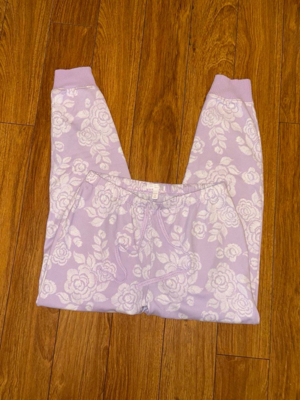 white & purple floral sweatpants with rose print